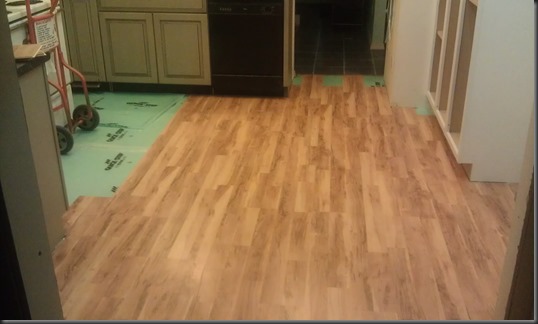 Several Hours & Almost 5 Boxes of Flooring Later!
